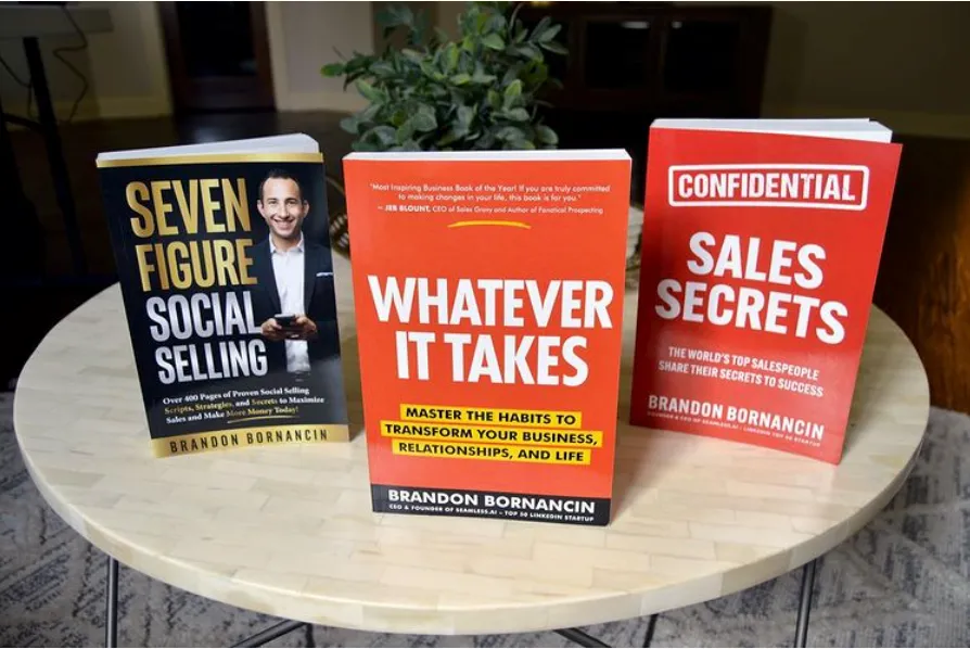 3 books by Brandon Bornancin standing up on a table